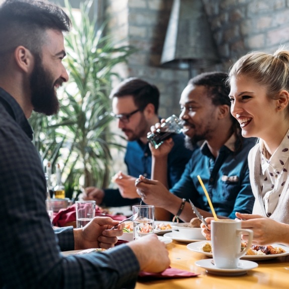 Guests enjoying a meal at a local restaurant