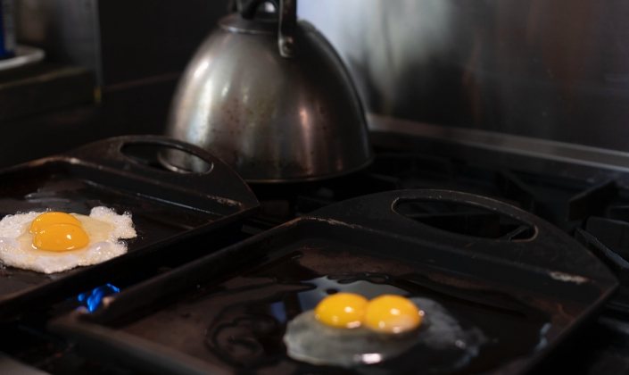 Eggs cooking on stove