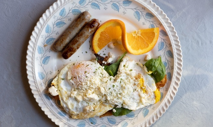 Egg and sausage breakfast on plate