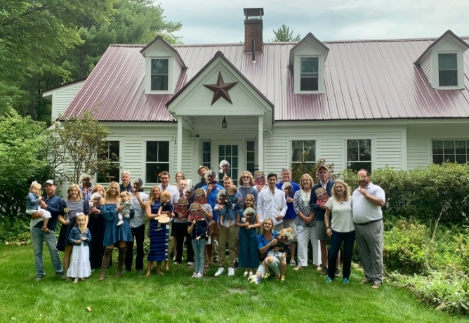 Group of people outside of Buttonwood Inn on Mt Surprise