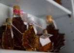 Decorative bottles of maple syrup