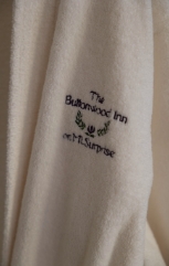 Buttonwood Inn on Mt Surprise logo on robe