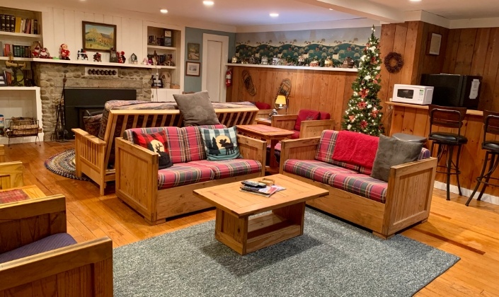 Large meeting room with sets of couches and chairs