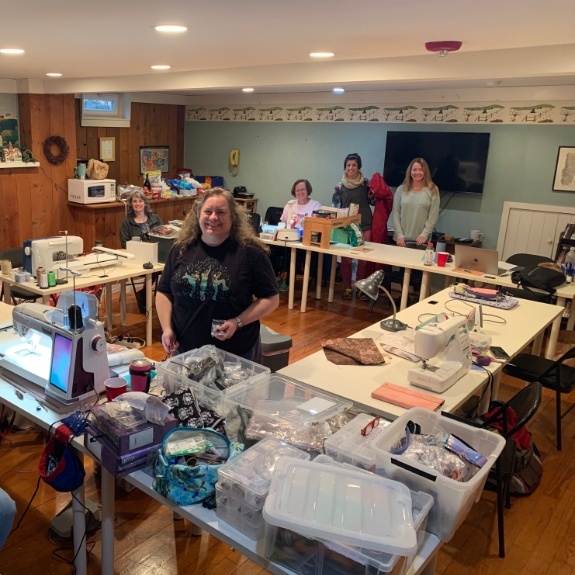 Group of people using meeting space for a craft retreat