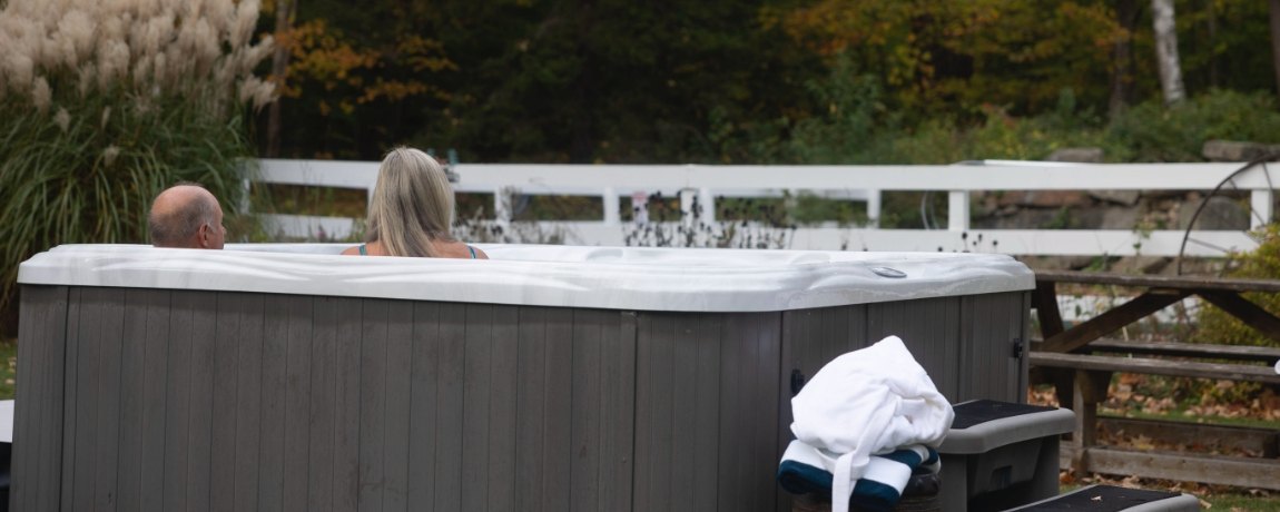 Two people enjoying the hot tub