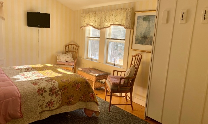 Bedroom with comfortable sitting area