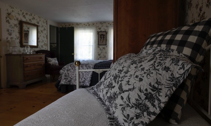 Large guest room with comfortable furnishings