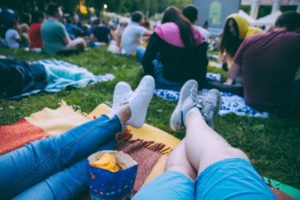 a closeup of people enjoying an outdoor event 