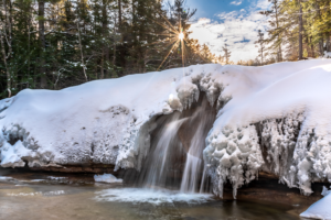 a frozen waterfall during the winter