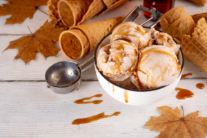 a bowl of ice cream with maple syrup
