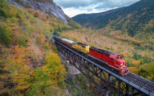 a train passing through mountains in North Conway